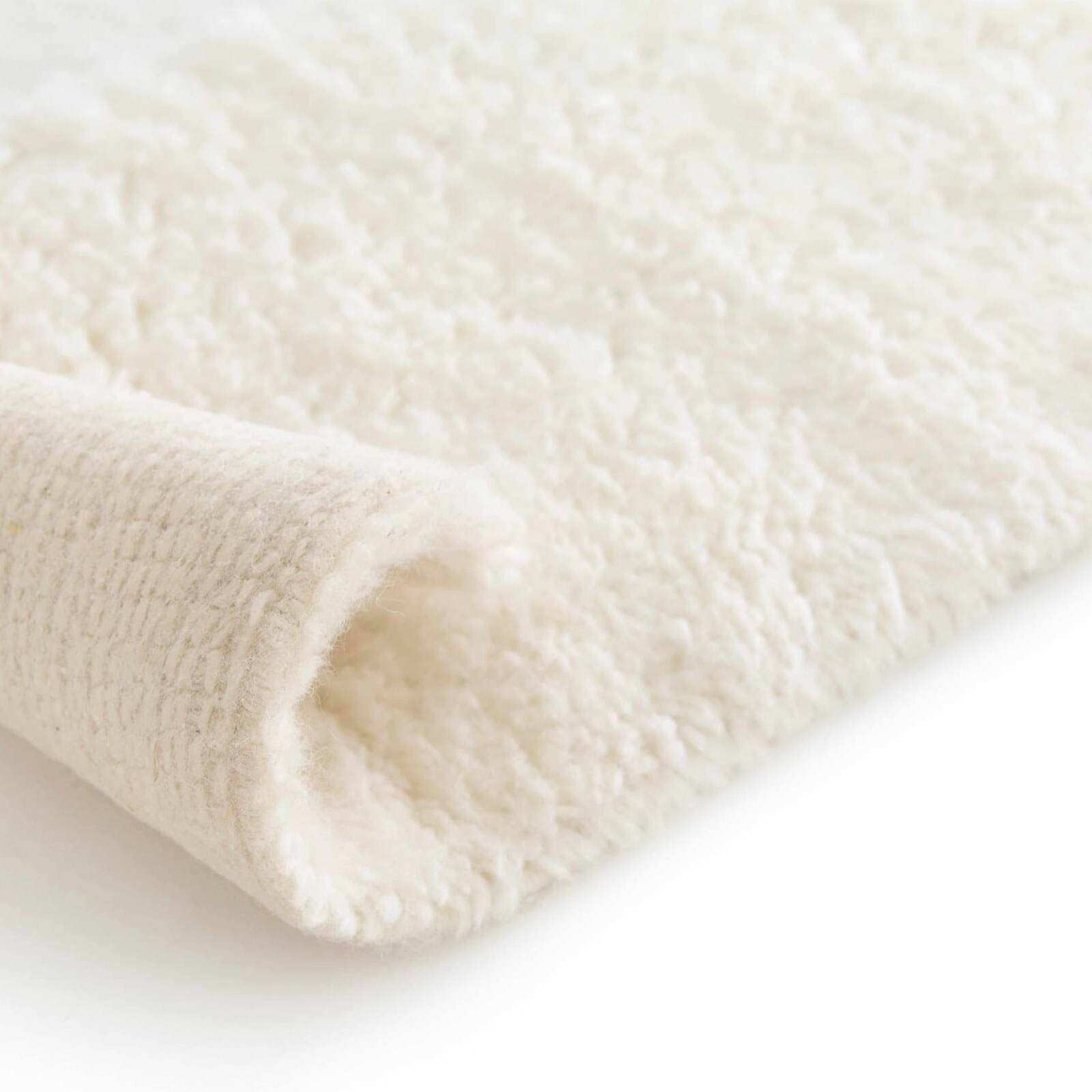 Rechteckiger Wollteppich mit handgewebtem Muster und kurzem Flor 