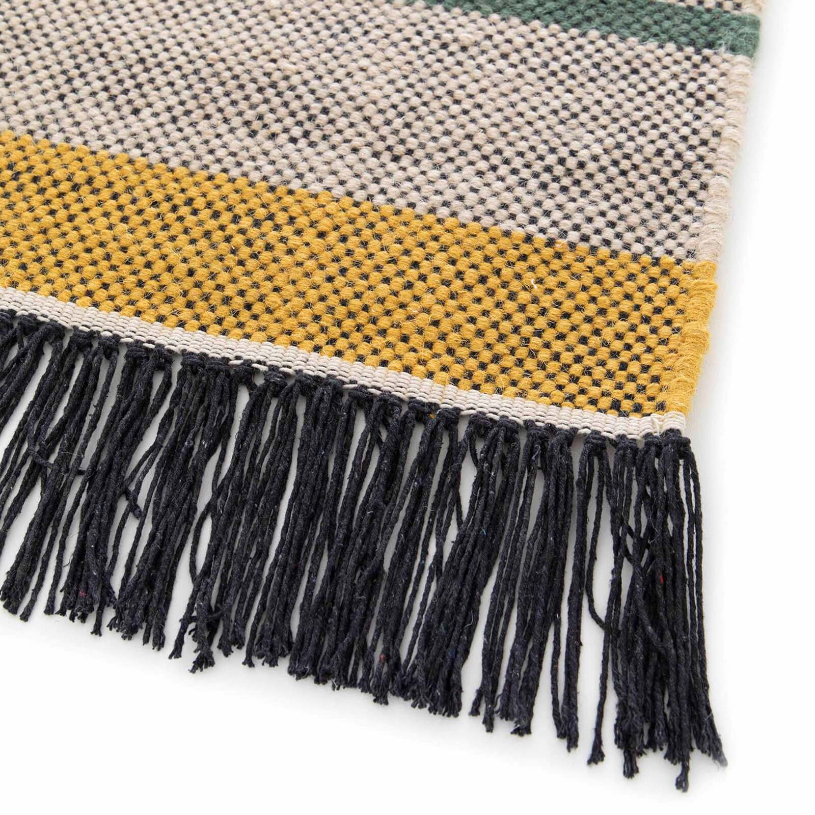 Rechteckiger flach gewebter Wollteppich mit Mustern und Fransen 