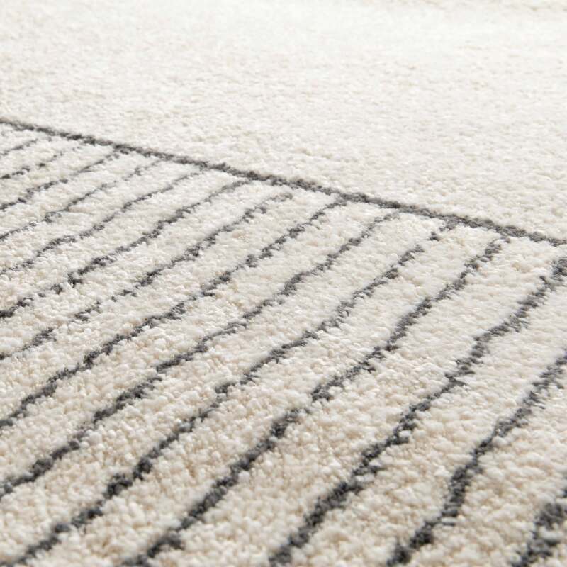 Rechteckiger Teppich mit linearem Muster und kurzem Flor