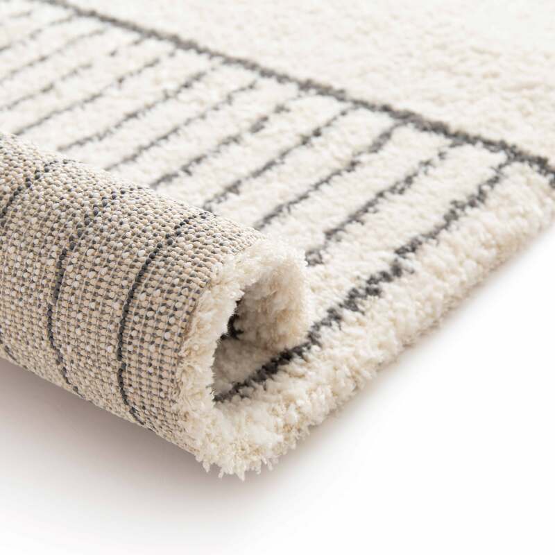 Rechteckiger Teppich mit linearem Muster und kurzem Flor