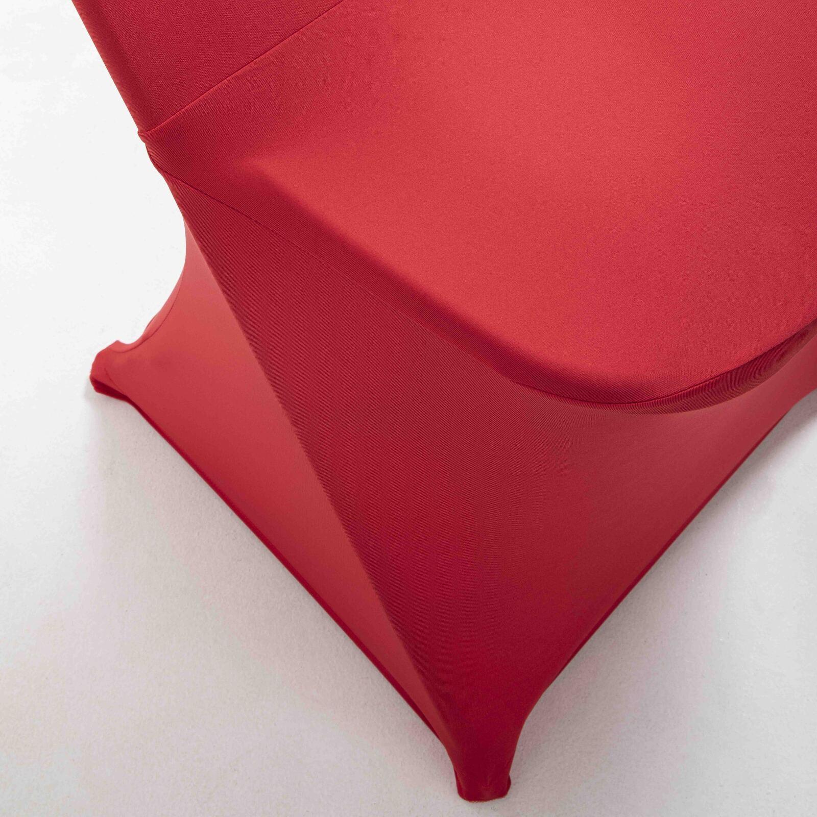 Klappstuhl und roter Stuhlbezug Klappstuhl und roter Stuhlbezug