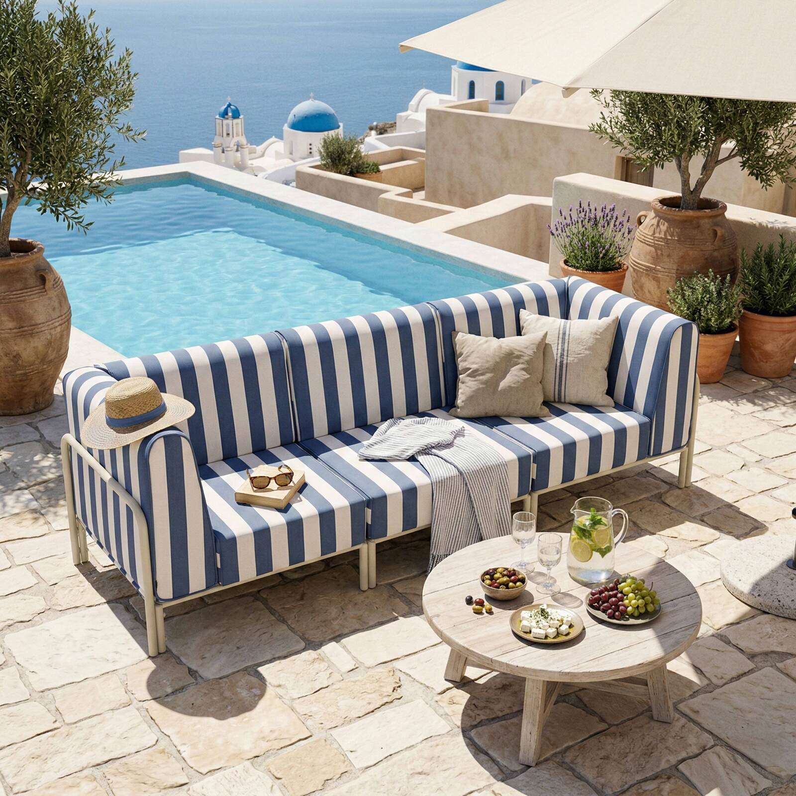 Modulare Gartenmöbel für 3 Personen bestehend aus 1 Sessel und 2 Ecksesseln im gestreiften Design