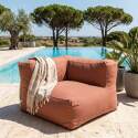 Modulare Gartenmöbel für 4 Personen bestehend aus 1 Sessel, 2 Ecksesseln und 1 Ottomane im gestreiften Design