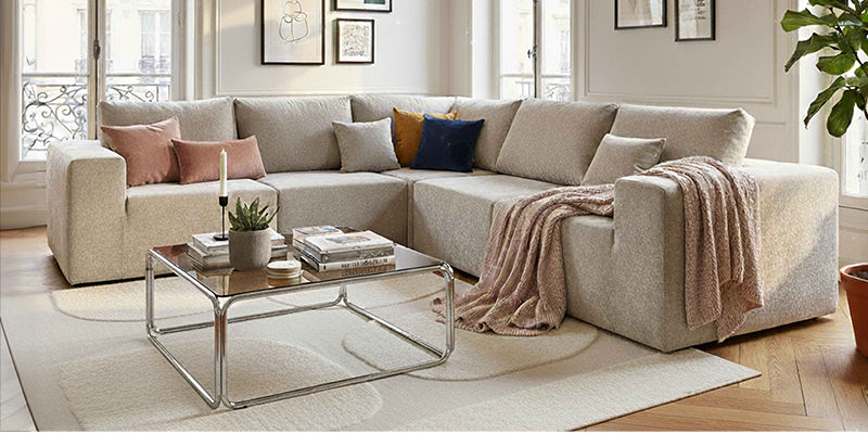 Modulares Sofa mit Couchtisch aus Glasplatte